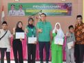 Bupati Batang Hari Serahkan Sertifikat PTSL dan Beasiswa Batang Hari Tangguh di Kecamatan Pemayung